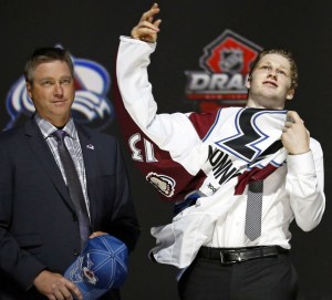 Nathan Mackinnon is selected by the Avalanche as the first overall pick in the 2013 NHL draft in Newark